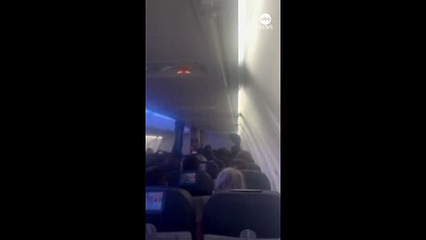 TERROR IN THE SKIES: Panicked passengers scream as their aircraft hits strong turbulence during