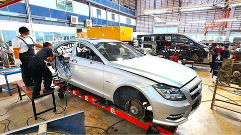 Mercedes-Benz CLS repair on Celette bench with dedicated jigs