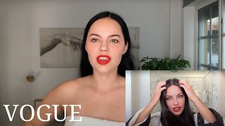 Elli Adalmina following Adriana Lima's VOGUE makeup tutorial