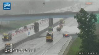 Snowplow clears I-94 flooding