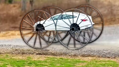 He Put Giant Wheels on His Tesla