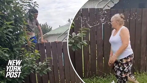 Neighbors climb fence and hurl abuse at mum in wild reaction to simple request