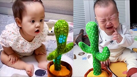 Cute baby 🍼 playing with dancing cactus😂😘