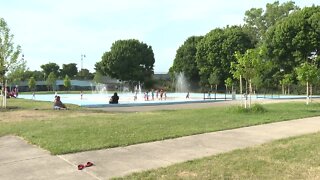 Kids beating the heat and having fun at the splash pads