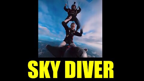 Skydiver hitch a ride on a wingsuit flyer