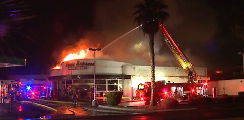 Las Vegas firefighters battle fire at mini-mart on Monday