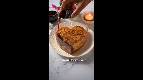 Every bite of this Tiramisu Heart Cake ❤️🍰 A perfect blend of coffee-infused layers🍓🤗