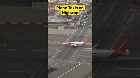 Cars Queue to Drive on Airport Runway