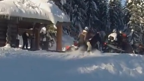 Snowmobiler crashes into fellow rider while parking at the cabin