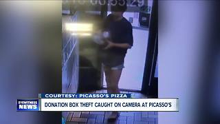 Woman caught on camera stealing donation box from pizzeria