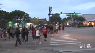 Lake Worth Beach vigil sends message of unity amidst unrest