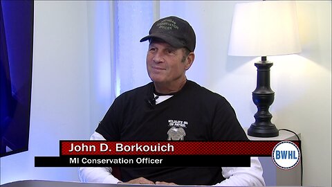 Former Michigan Conservation Officer, John D. Borkouich
