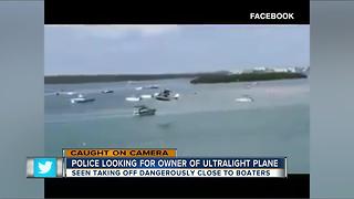 CAUGHT ON CAMERA: Small plane illegally flies dangerously close to boats at busy tourist attraction