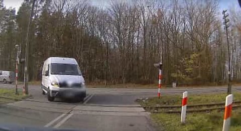 Van ignores stop sign and is hit by a train in Poland