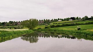 Rain on water in the beautiful Summer Leys Nature Reserve, Wollaston, Wellingborough, UK