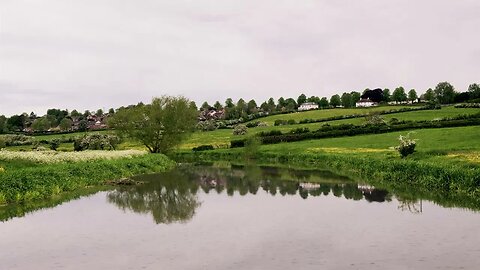 Rain on water in the beautiful Summer Leys Nature Reserve, Wollaston, Wellingborough, UK