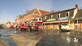 Three-alarm fire ignites Saturday night at Edmondson Village Shopping Center