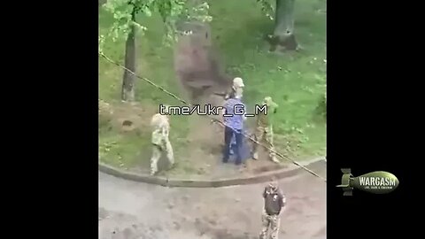 Army mobilization officers harrassing a Ukrainian man