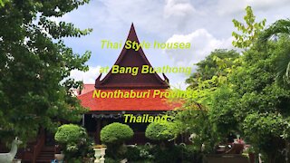 Thai style houses at a lake at Bang Buathong in Thailand