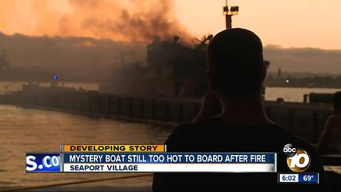 Mystery boat still smoldering after it erupts in a fireball on Friday