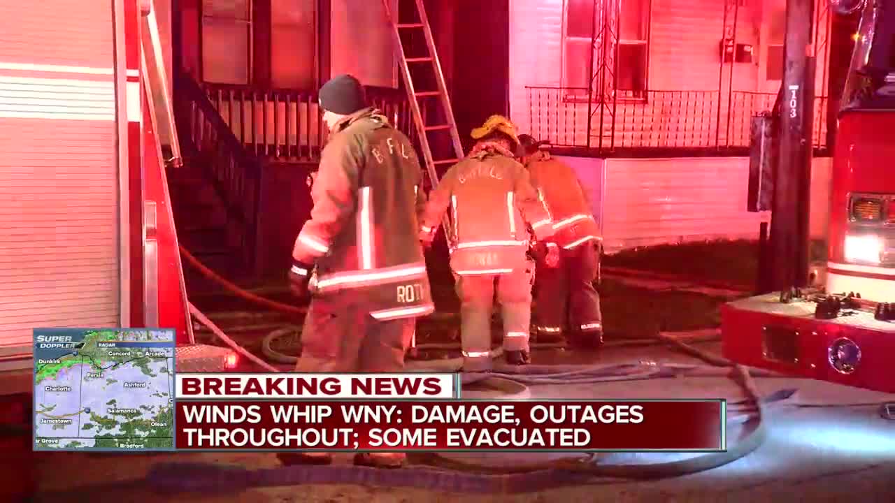 Crews battle flames, whipping winds at East Side house fire