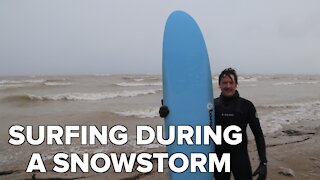 Snowstorm surfing: Milwaukee man defies wind and cold to hit the water
