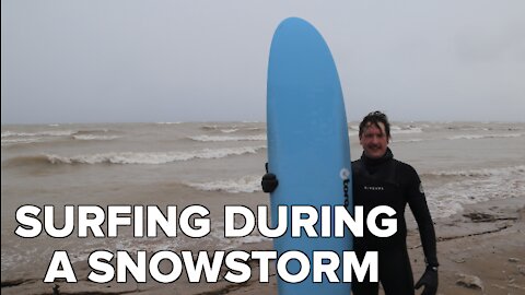 Snowstorm surfing: Milwaukee man defies wind and cold to hit the water