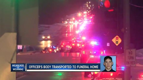 Procession escorts fallen Milwaukee police officer Matthew Rittner's body to Brookfield funeral home