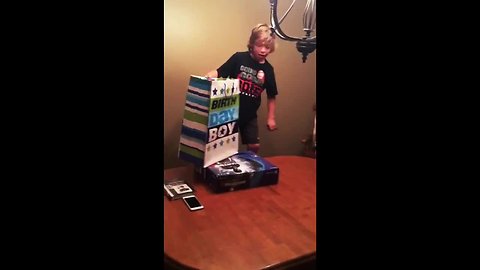 Tearful kid literally speechless for PS4 birthday gift