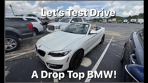 Let's test drive a drop top BMW!