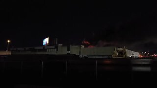 Truck in a blaze on Pearl Harbor Bridge.