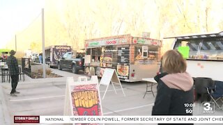People gather for Friday Night Bites and Lights at Papillion landing