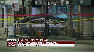 Car crashes into building on Wisconsin Avenue in downtown Milwaukee