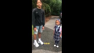 Little girl stands on business