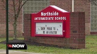 Stark County mother after posting school threat