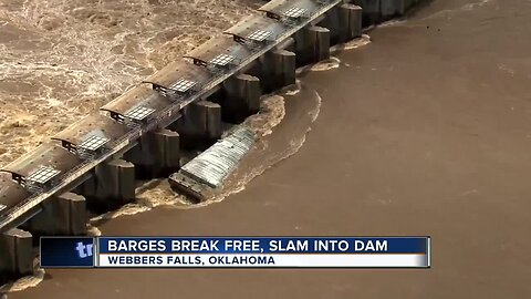 Barges break free, slam into Oklahoma dam