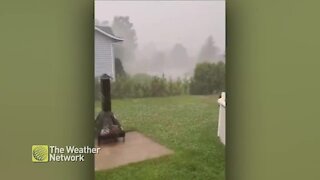 Fiercely falling hail slams Quebec yard