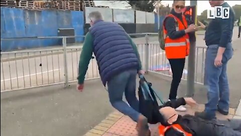 Angry Drivers Drag Environmental Protesters Off The Street in London