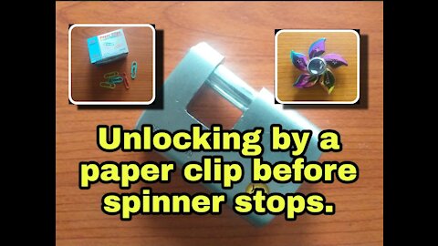 Unlocking this hard lock by a paperclip before the spinner stops.