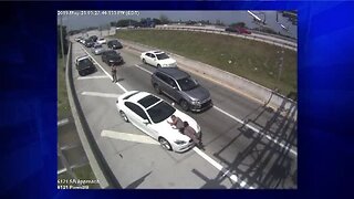 Surveillance video shows driver running over Florida state trooper