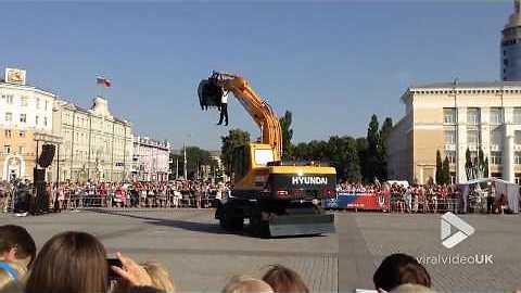 French Dancer Performs Ballet With An Earth Digger
