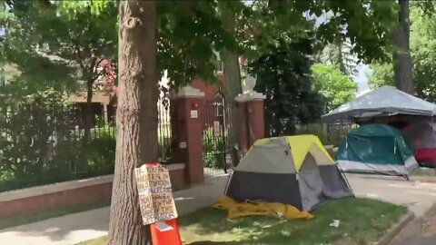 Person caught on video wielding a machete at homeless camp outside the Colorado Governor's Mansion