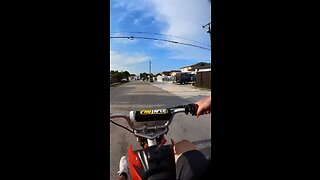 Bike leans hard right on wheelie