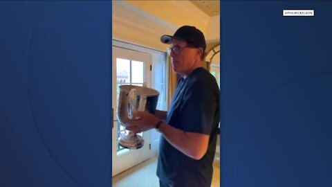 Phil Mickelson drinks wine out of PGA Championship's Wanamaker Trophy