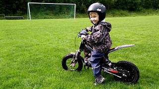 2-year-old masters electric motorcycle without training wheels