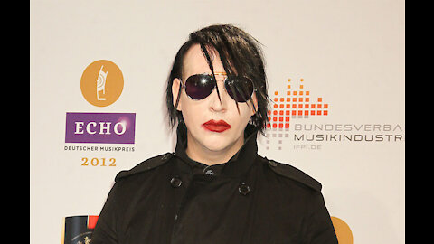 Marilyn Manson is wanted on an arrest warrant for allegedly shooting snot on a camerawoman