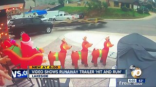 Caught on video: Runaway trailer crashes into SUV in driveway