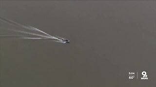 Divers search Ohio River for missing boy