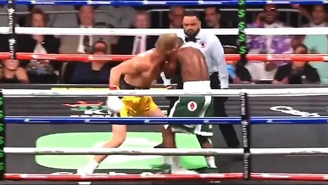 Did Logan Paul try to head butt, kiss or bite the ear of Floyd Mayweather mid fight