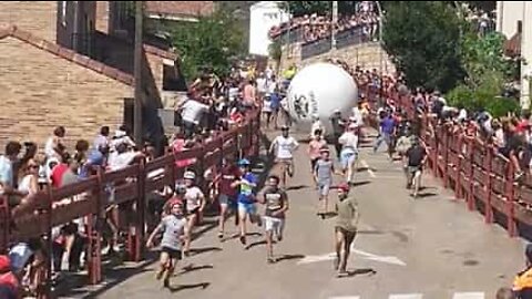 Villagers try and outrun giant ball just like Indiana Jones